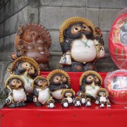 Statues of tanuki (raccoon dogs), notable for their huge testicles.