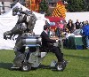 You guessed it, a huge robot riding on the back of a motorised wheelchair.