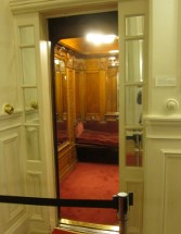 Old wood-panelled lift.